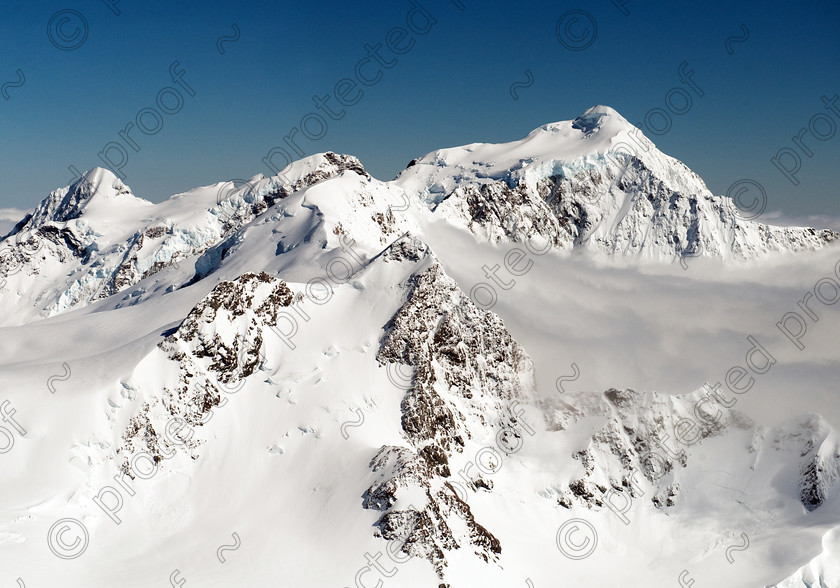 HWP 7550 
 Mount Cook 
 Keywords: Mount Cook, New Zealand, mountain, ice, snow, skiing, aerial photography, mist, weather, climate,