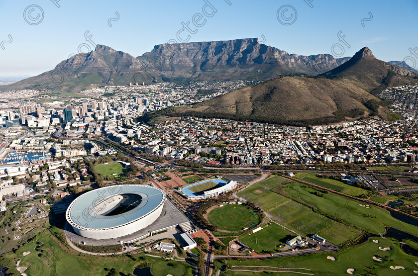 Cape Town 
 Aerial view of Cape Town showing; Table Mountain , Lions Head, Devils Peak & 2013 FIFA Stadium 
 Keywords: Aerial, Aerial Photography, Cape Town, Devils Peak, FIFA, Green Point, Lions Head, Photography, South Africa, Staduim, Table Mountain, Western Cape, World Cup