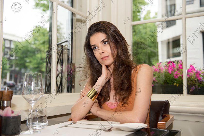 D4S1407 
 Pretty Girl waiting in Restaurant 
 Keywords: pretty,girl,brunette,restaurant,bistro,cafe,formal,waiting,first date,Amsterdam,Netherlands