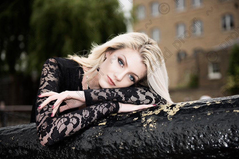 D4S1024-2 pp 
 Outdoor Fashion Portrait of Young Lady with Blonde hair - gazing camera, wearing back lace top 
 Keywords: Outdoor, Fashion, editorial, portrait,blonde, black lace